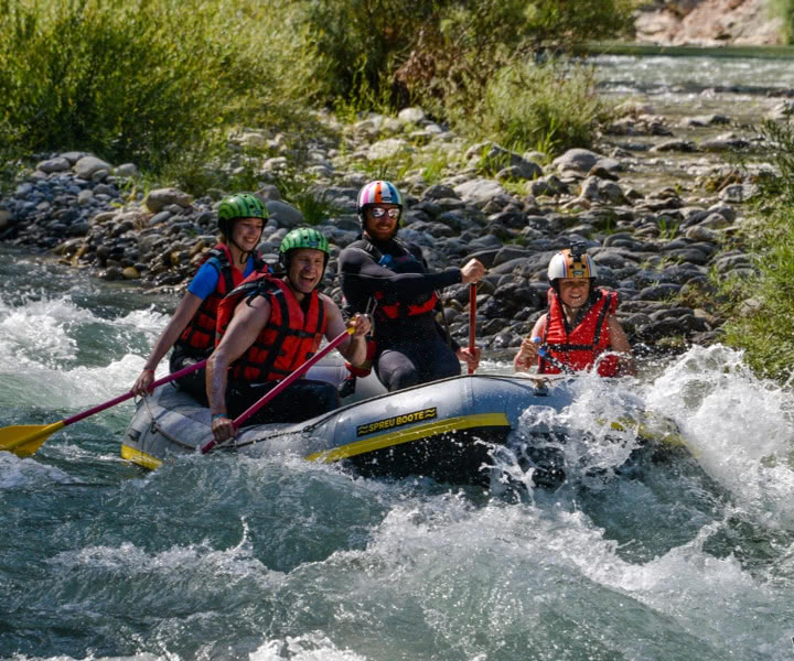 Enjoy family activity riding a raft